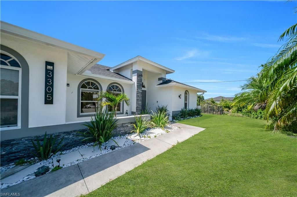 3305 5th ST SW, LEHIGH ACRES, FL 33976 — photo 2
