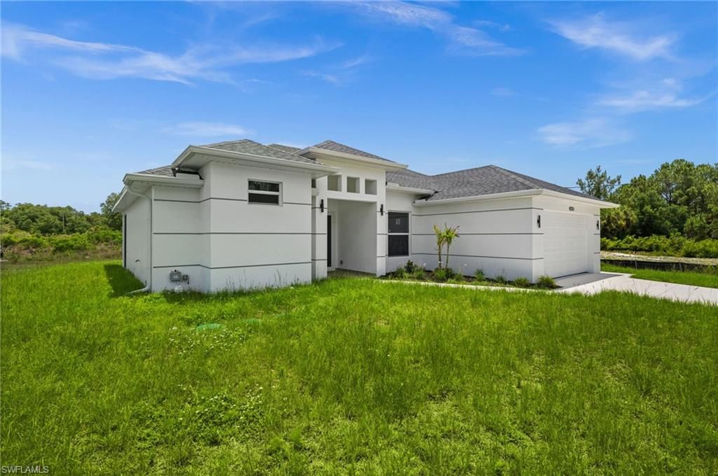 1208 JEFFERSON AVE, LEHIGH ACRES, FL 33972 — photo 2
