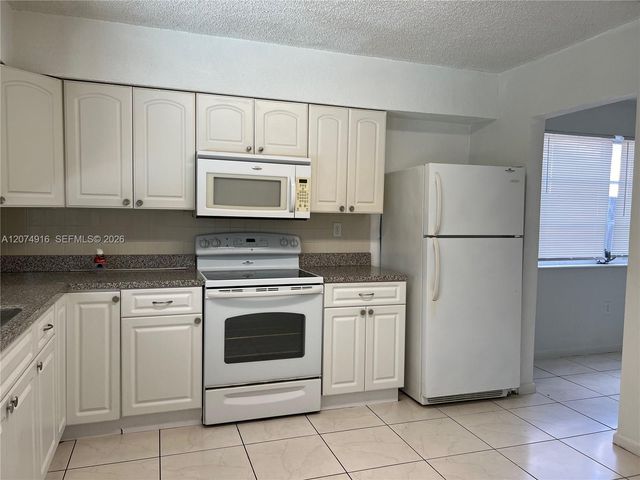 5966 NW 15th Court, Sunrise, FL 33313