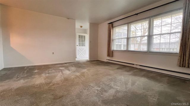 72 Enfield Court A, Ridge, NY 11961