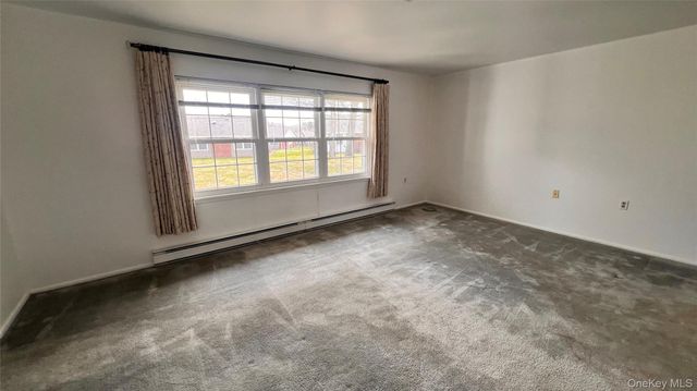 72 Enfield Court A, Ridge, NY 11961