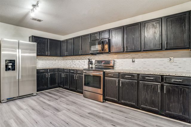 1130 Annie Oakley Drive, Anna, TX 75409
