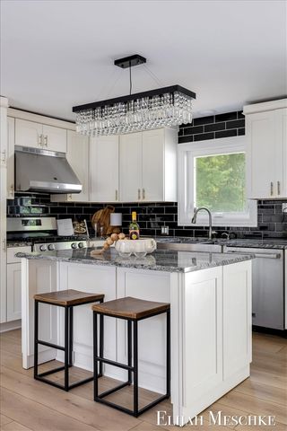 3240 E Riley Thompson Road, Twin Lake, MI 49457