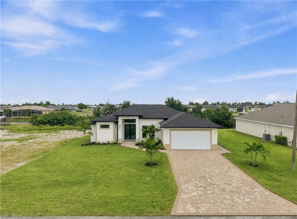 307 NE 15th ST, CAPE CORAL, FL 33909 — exterior