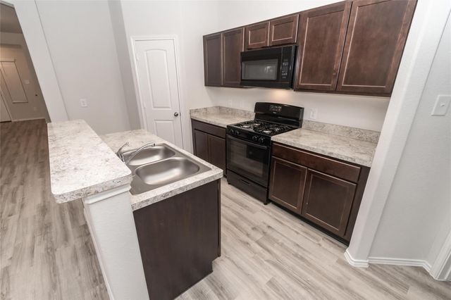 13633 Briana Brook Court, Willis, TX 77378