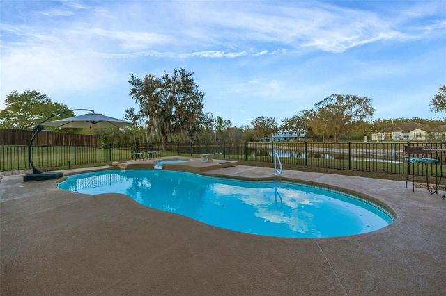 1710 NEWBERGER ROAD, Lutz, FL 33549