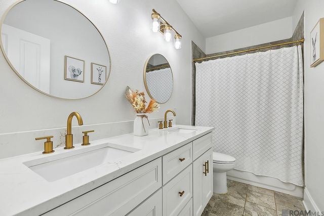 12221 Hampton Village Ave, Central, LA 70818