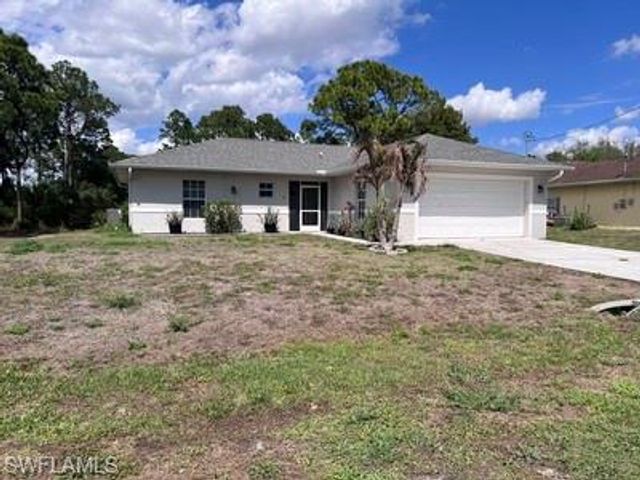 1107 Enrique ST E, Lehigh Acres, FL 33974