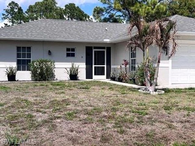 1107 Enrique ST E, Lehigh Acres, FL 33974