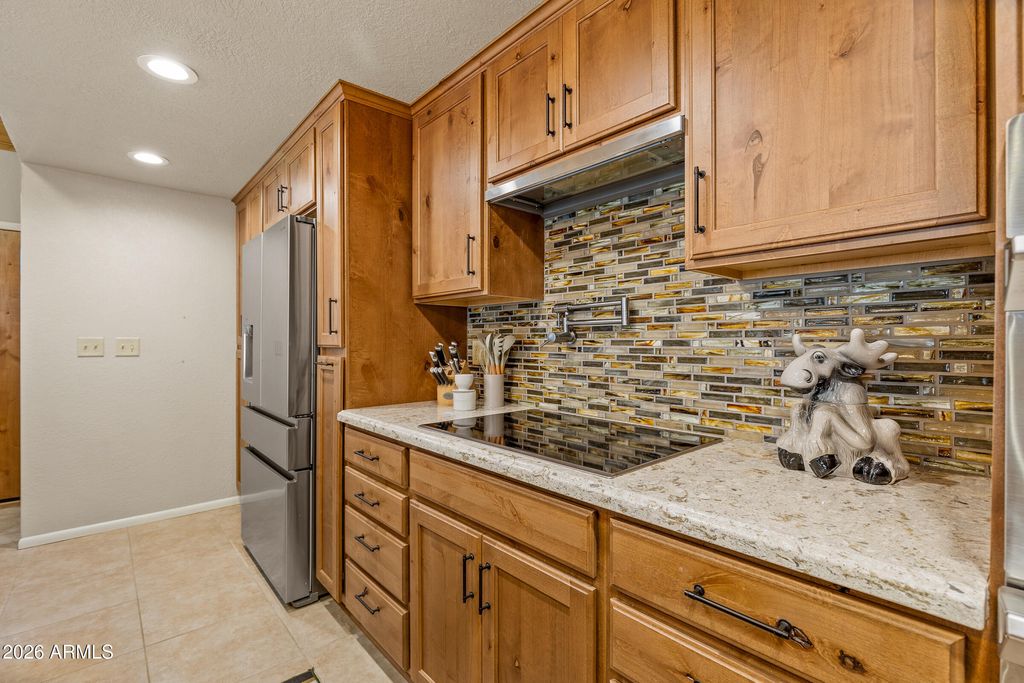 Image 12 of property listing at 935 E RAINTREE Road, Munds Park, AZ 86017