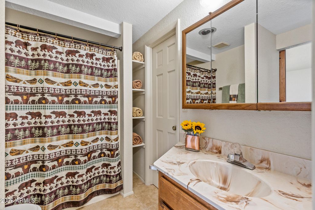 Image 17 of property listing at 935 E RAINTREE Road, Munds Park, AZ 86017