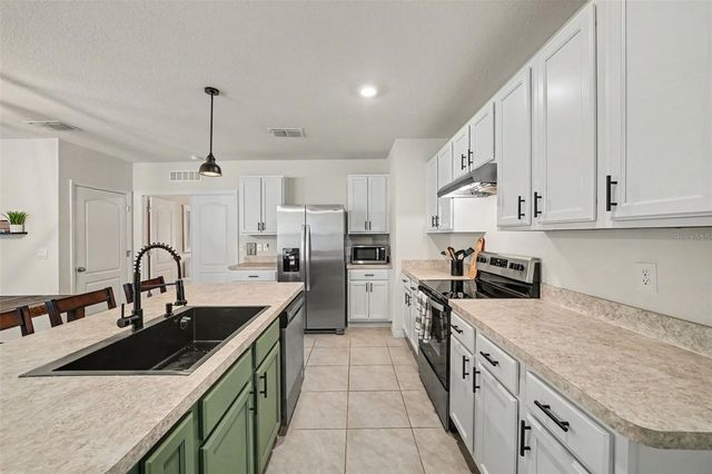 6784 HUNTLEIGH HAMMOCK ROAD, St Cloud, FL 34773