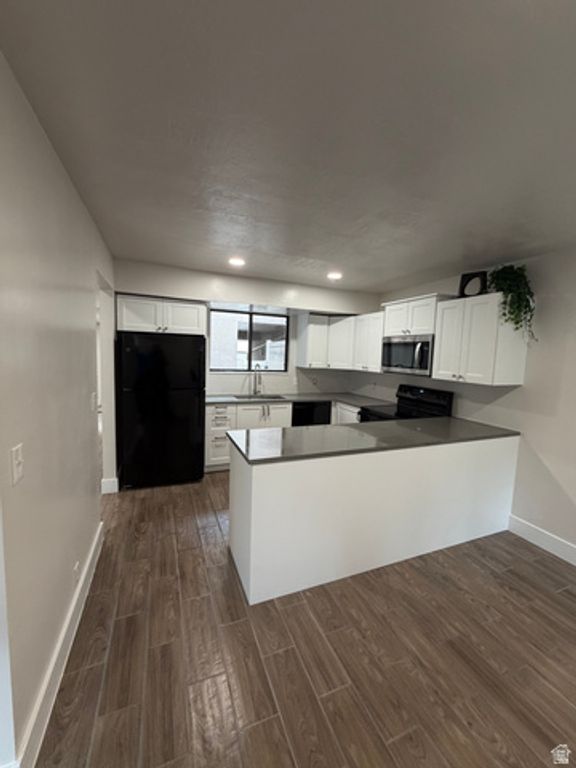 Image 2 of property listing at 8722 S OAKWOOD PARK CIR, Sandy, UT 84094