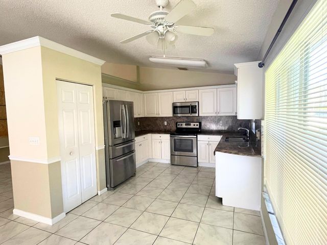 8265 White Rock Circle, Boynton Beach, FL 33436