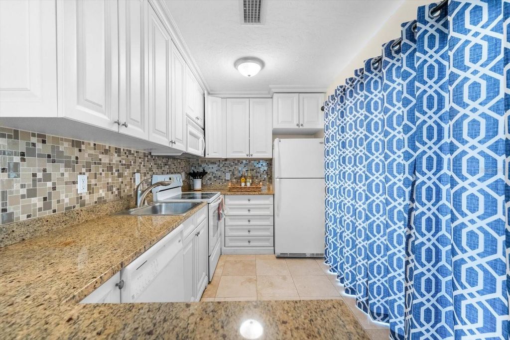 Image 13 of property listing at 6451 ELMWOOD AVENUE H, Sarasota, FL 34231