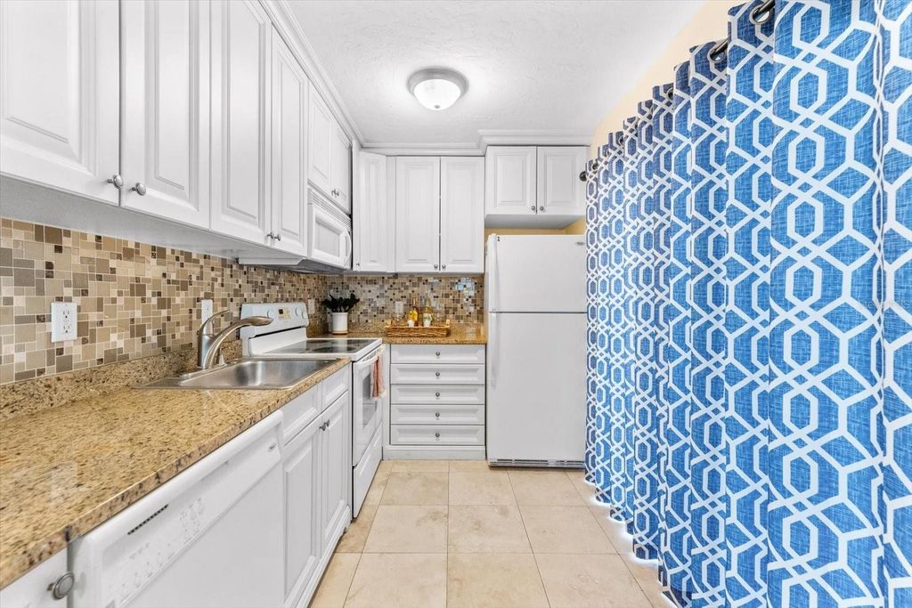 Image 29 of property listing at 6451 ELMWOOD AVENUE H, Sarasota, FL 34231