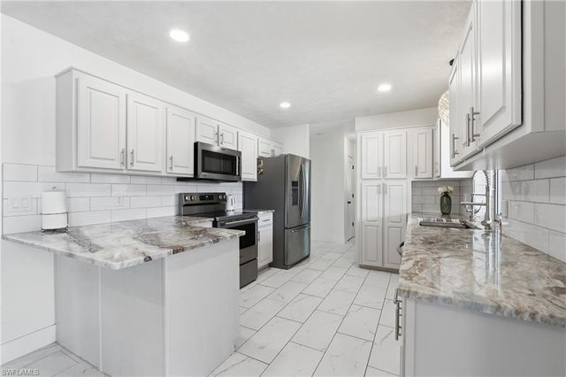 1446 SE 13th ST, Cape Coral, FL 33990