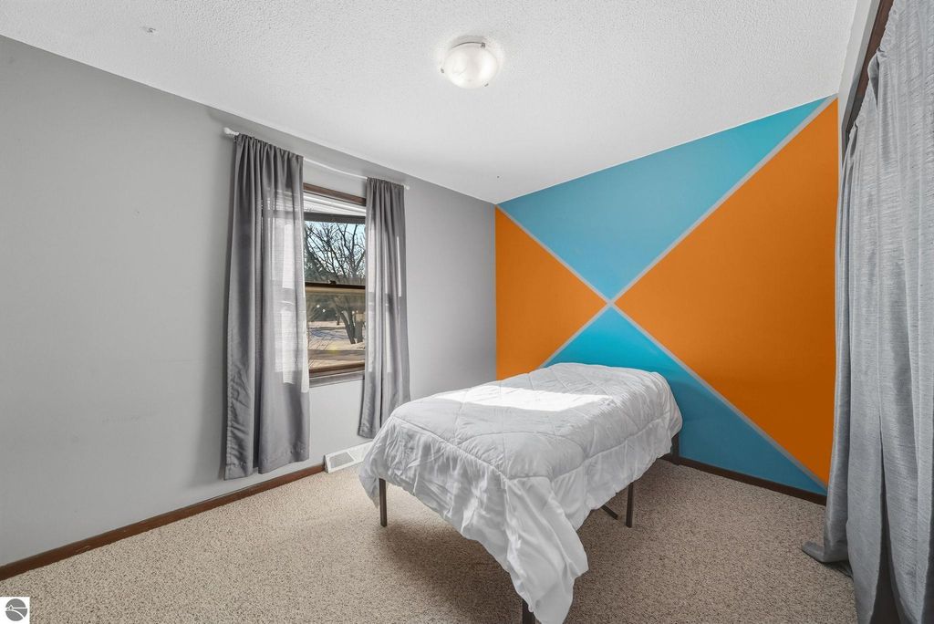 Image 21 of property listing at 8320 W Whispering Pine Circle, Lake City, MI 49651