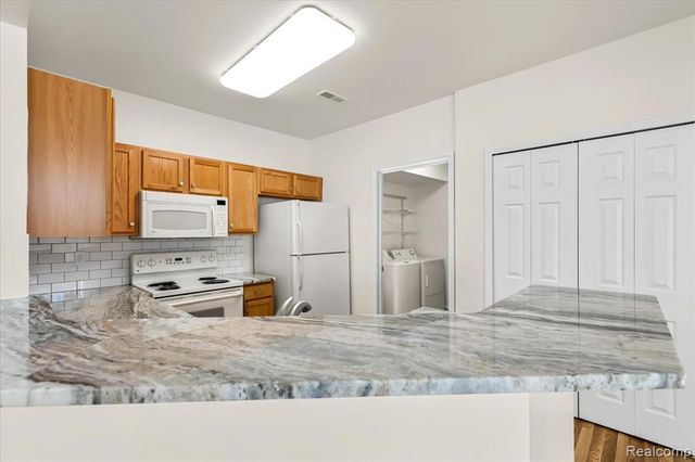 17104 Chesapeake Circle, Walled Lake, MI 48390