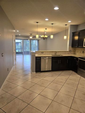 527 VIRTUOSO LANE 79, Orlando, FL 32824