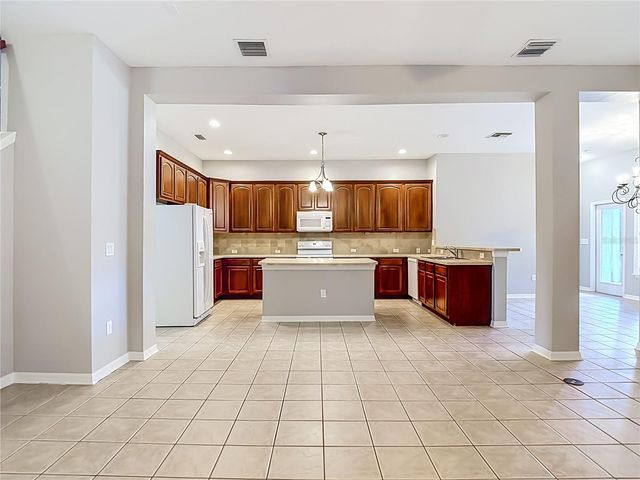 7015 CARDINALWOOD LANE, Land O Lakes, FL 34637