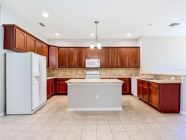7015 CARDINALWOOD LANE, Land O Lakes, FL 34637