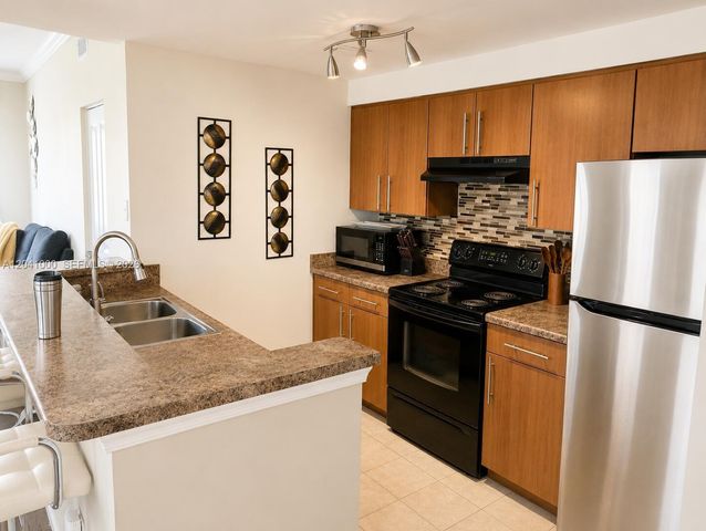 5980 W Sample Road 307, Coral Springs, FL 33067
