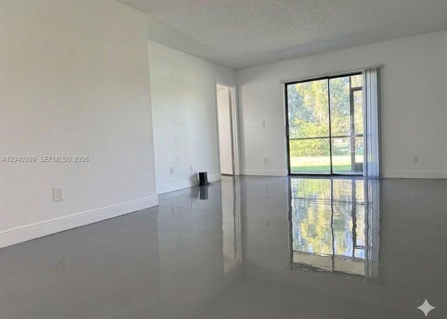 10325 NW 11th Street 101, Pembroke Pines, FL 33026