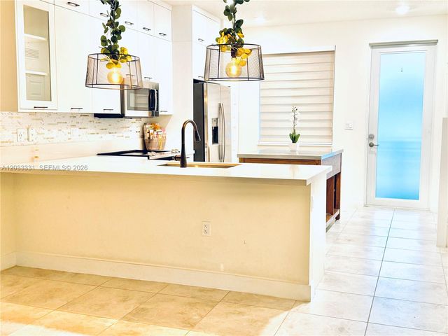 10295 NW 64th Terrace 104, Doral, FL 33178