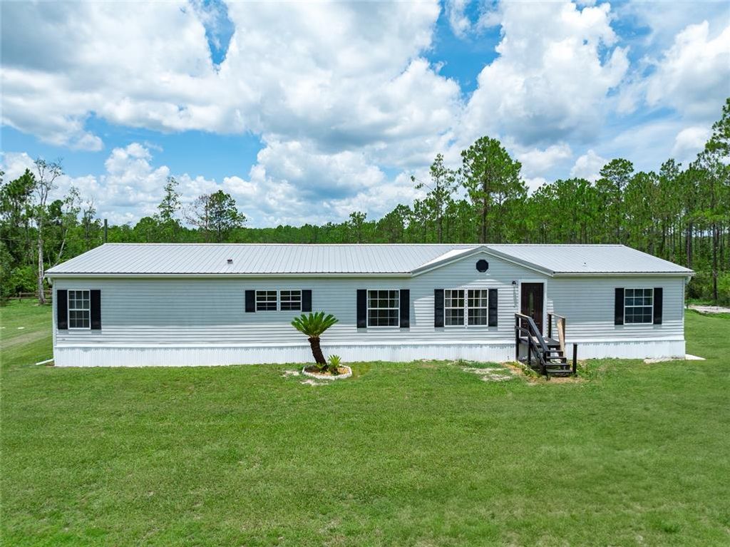 6190 WINNING WOOD TRAIL, De Leon Springs, FL 32130
