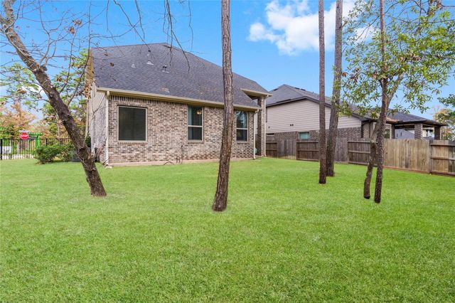 313 Serenata Woods Trail, Conroe, TX 77318