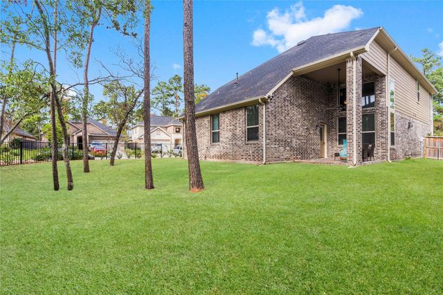 313 Serenata Woods Trail, Conroe, TX 77318