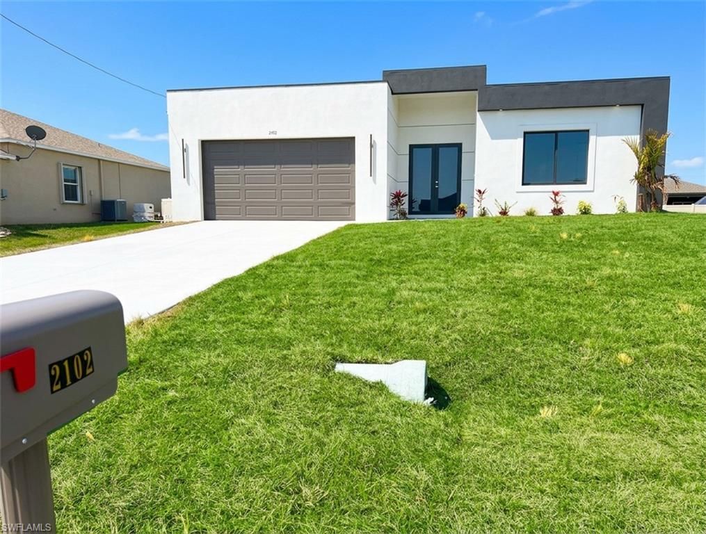 Image 3 of property listing at 2102 NW 25th PL, Cape Coral, FL 33993