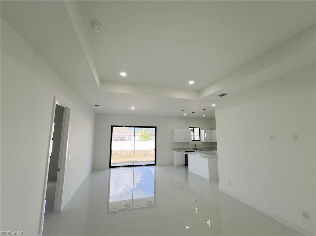 Image 5 of property listing at 2102 NW 25th PL, Cape Coral, FL 33993