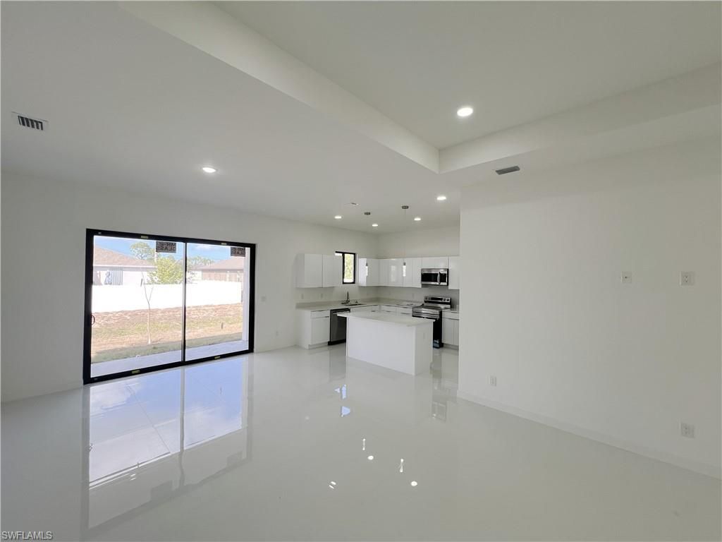 Image 6 of property listing at 2102 NW 25th PL, Cape Coral, FL 33993