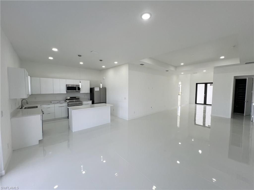 Image 8 of property listing at 2102 NW 25th PL, Cape Coral, FL 33993