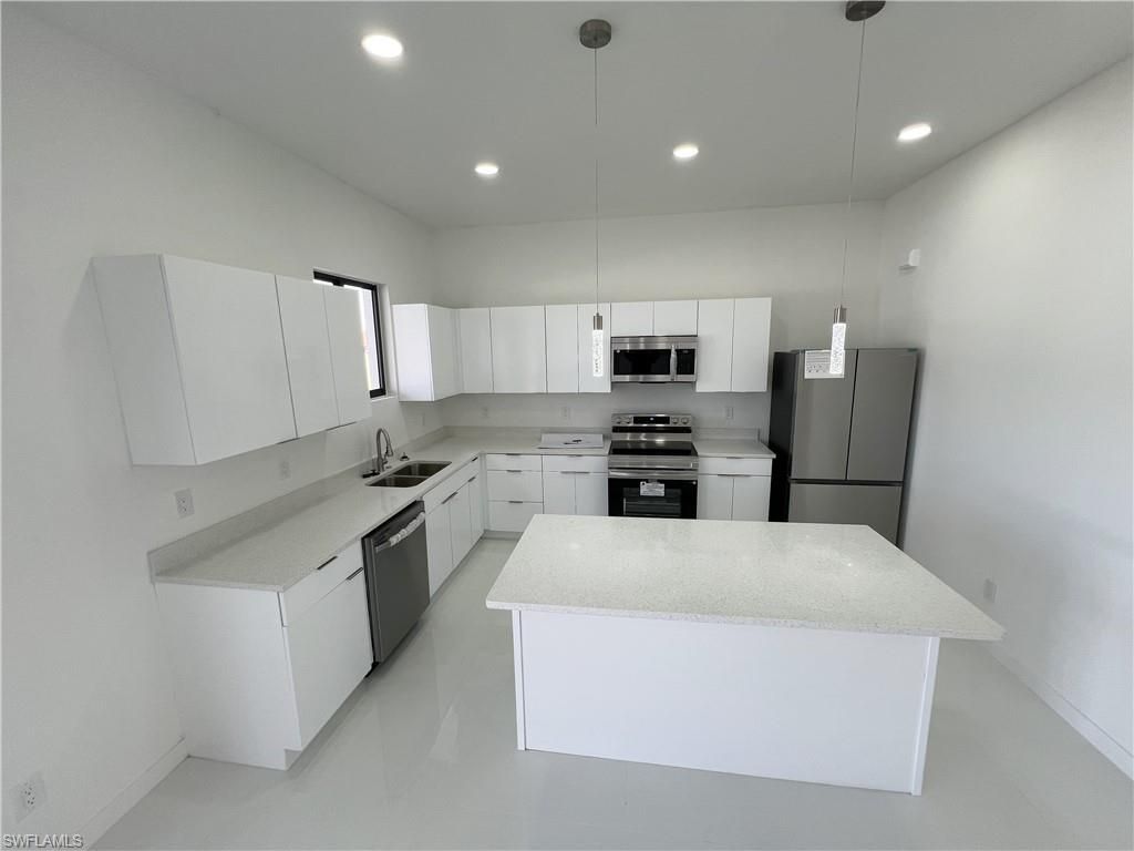 Image 9 of property listing at 2102 NW 25th PL, Cape Coral, FL 33993