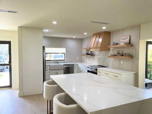 1303 Clubhouse Circle, Jupiter, FL 33477