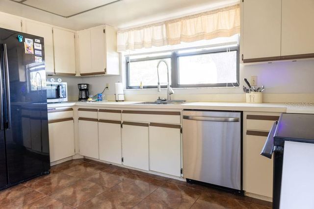 1707 WHISPERING DRIVE E, Largo, FL 33771
