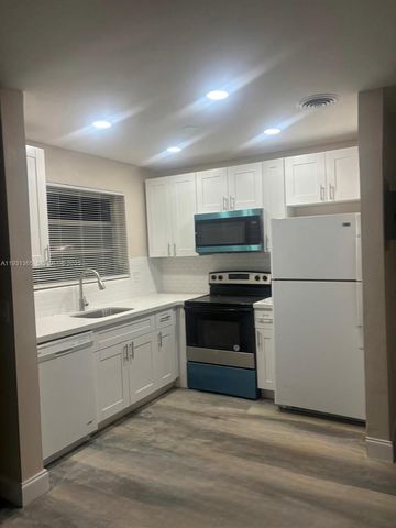 3033 NW 43rd Ave 106, Lauderdale Lakes, FL 33313