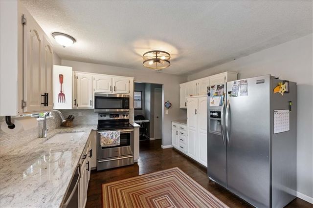 703 Ozark Short Line Court, Odessa, MO 64076