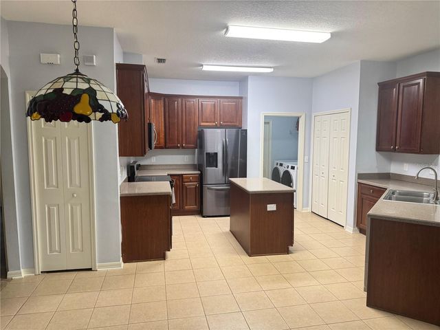 6823 GREEN HERON DRIVE, Wesley Chapel, FL 33545