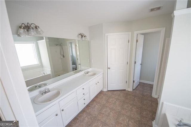 8145 Lockslay Way, Suwanee, GA 30024