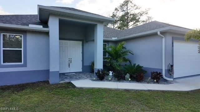 1103 W 13th ST, Lehigh Acres, FL 33972
