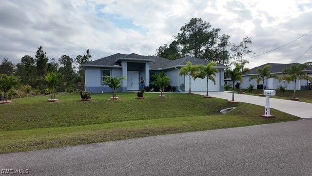 1103 W 13th ST, Lehigh Acres, FL 33972