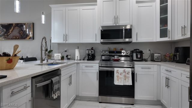 1103 W 13th ST, Lehigh Acres, FL 33972