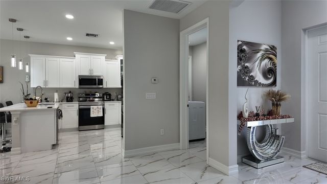 1103 W 13th ST, Lehigh Acres, FL 33972