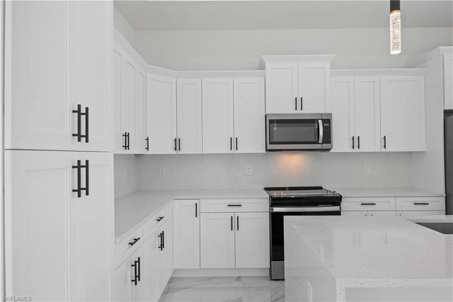 719 Fullerton AVE S, Lehigh Acres, FL 33974