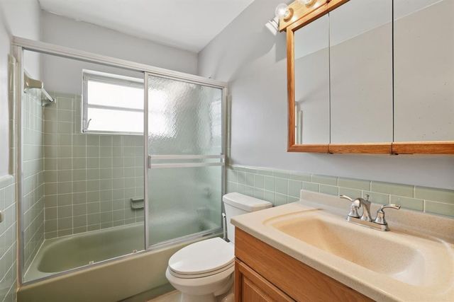 9407 NW 70th Place, Tamarac, FL 33321