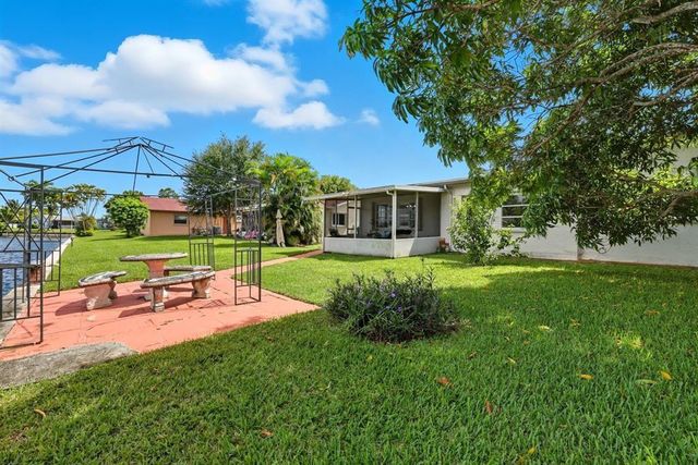 9407 NW 70th Place, Tamarac, FL 33321